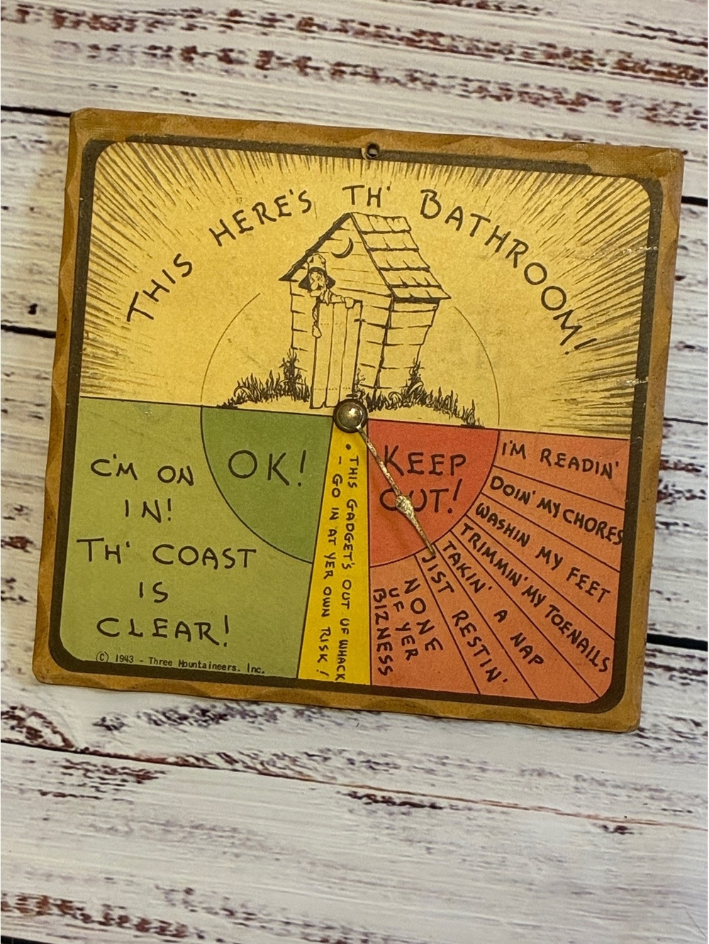 Vintage This Here's Th' Bathroom Spinner Sign Three Mountaineers Inc